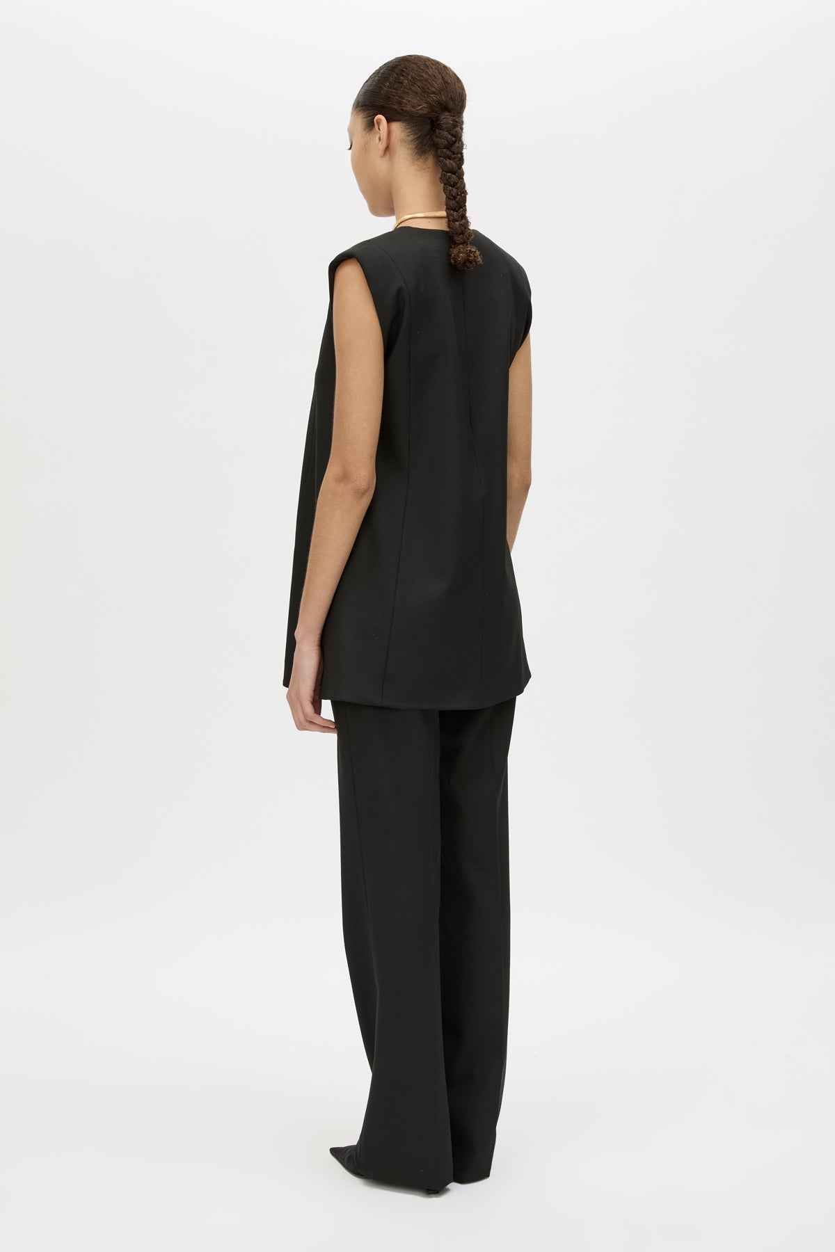 Back view CAMILLA AND MARC Cassie Top in Black with V‑neck sleeveless silhouette and removable snake‑chain detail.