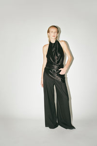 Styled view CAMILLA AND MARC Elowyn Halter Top in Black with a draped open back and asymmetric hem.