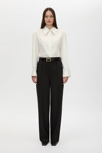 Styled view CAMILLA AND MARC adjustable Tarn Fitted Long Sleeve Shirt in cream with removable shoulder pads.