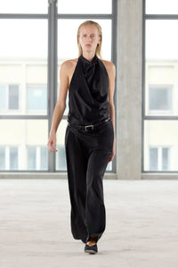 Runway view CAMILLA AND MARC Elowyn Halter Top in Black with a draped open back and asymmetric hem.