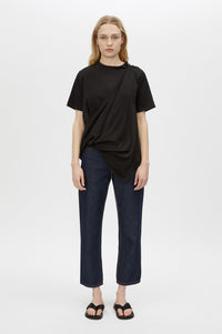 Styled view CAMILLA AND MARC Clarity draped oversized asymmetric tee in black with raw hemline and internal french seams.