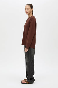 Side View CAMILLA AND MARC Donatello Knit Sweater in espresso brown with V neck and knit fabric.