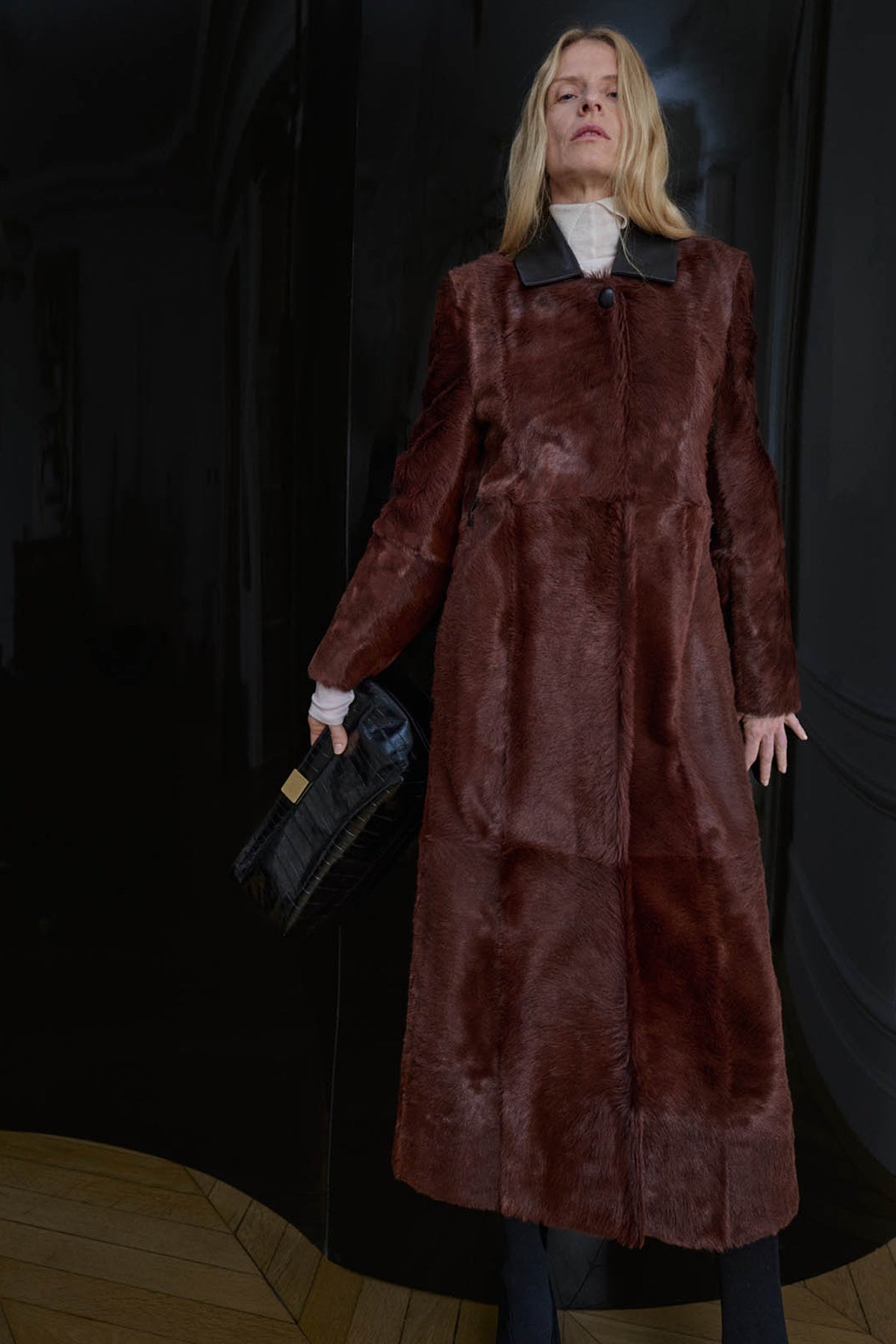 Styled view CAMILLA AND MARC Rina Coat in Chocolate Brown calf hair with contrast leather collar.