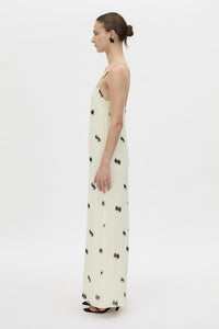 Side view CAMILLA AND MARC Adel Maxi Slip Dress with straight neckline and adjustable straps.