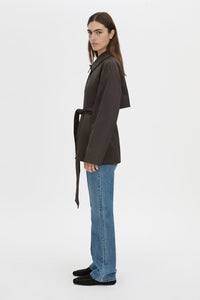 Side view CAMILLA AND MARC Aidra Short Trench Coat in hickory with twin-needle stitch detail.