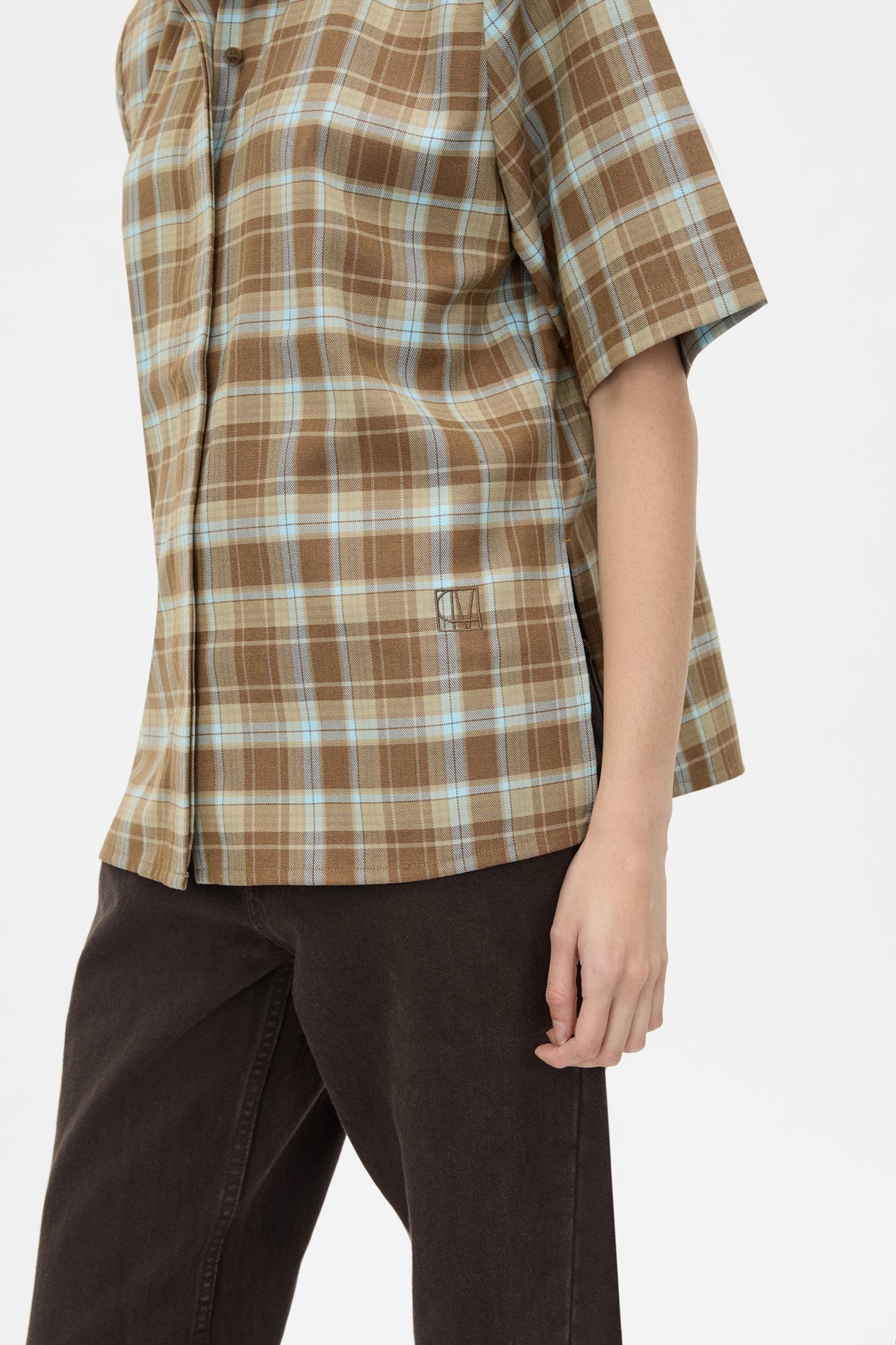 Close up view CAMILLA AND MARC Arian short-sleeve collared shirt in chocolate brown check.