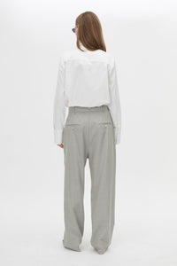 Back view CAMILLA AND MARC Aspira Pant in Dusty Blue with a wide‑leg tailored silhouette.