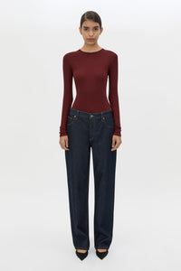 Front view CAMILLA AND MARC Barre Long Sleeve Top in Burgundy styled with the Manuela Denim Jean.