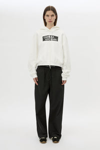 Front view CAMILLA AND MARC Carmont Graphic Hoodie in Soft White with boxy fit and black graphic logo.