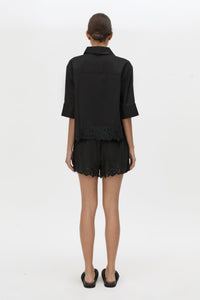 Back view CAMILLA AND MARC Chara Embroidered Cropped Shirt in Black with short sleeves.