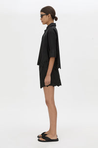 Side view CAMILLA AND MARC Chara Embroidered Cropped Shirt in Black with short sleeves.