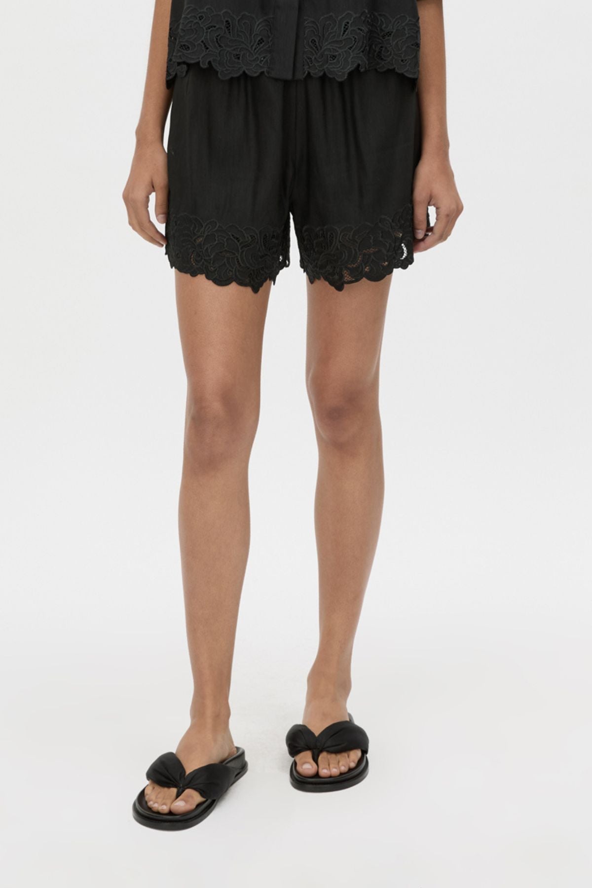 Cropped view CAMILLA AND MARC Chara Embroidered Short in black with embroidered hem and elasticated waistband.