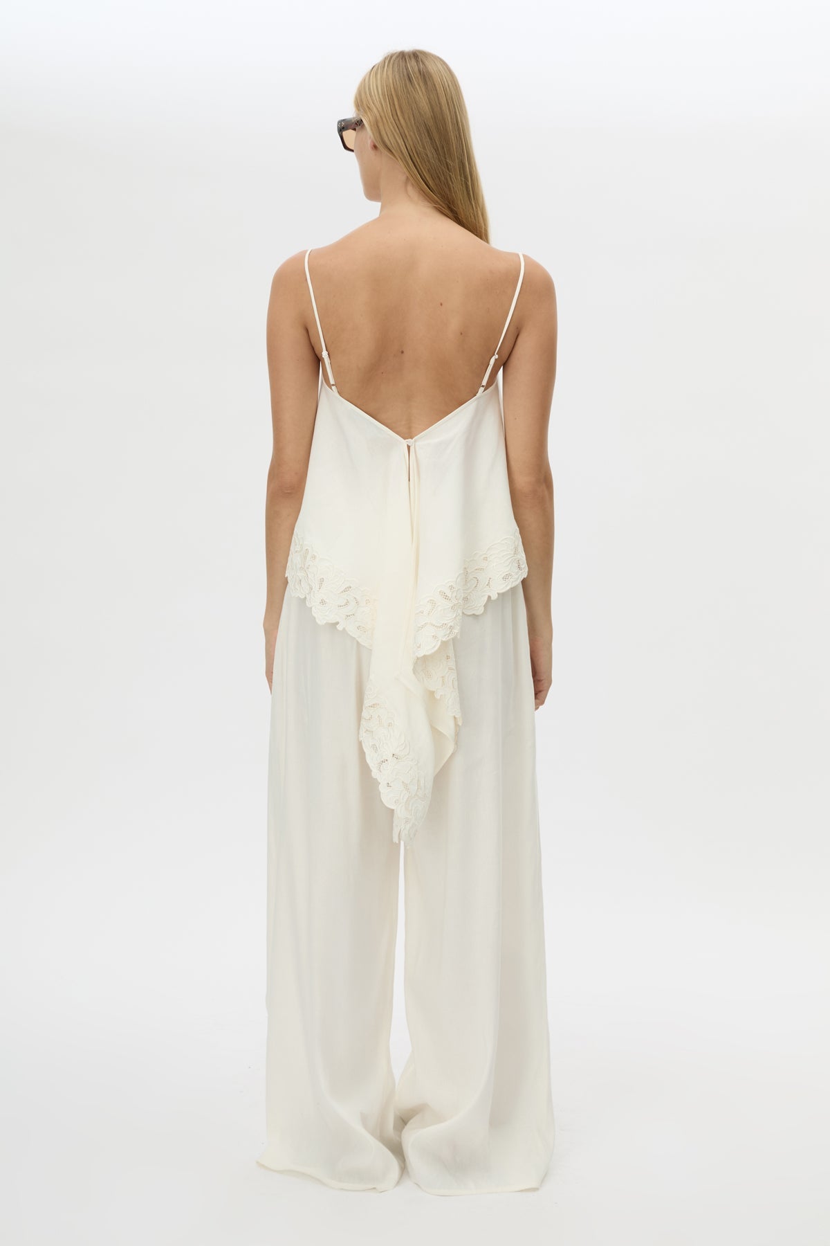 Back view CAMILLA AND MARC Chara Relaxed Pant in Cream with elastic waist, and back welts.