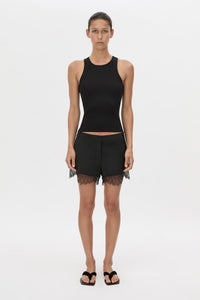Front-styled view CAMILLA AND MARC Chiaro Mini Short in black with lace hem detail.
