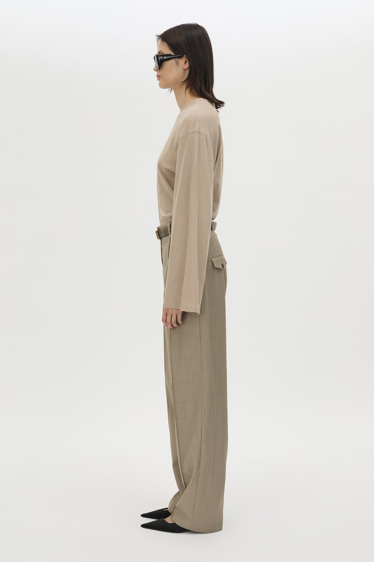 Side view CAMILLA AND MARC Dakota long sleeve relaxed top in taupe with crew neckline and semi sheer fabrication.