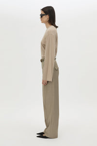Side view CAMILLA AND MARC Dakota long sleeve relaxed top in taupe with crew neckline and semi sheer fabrication.
