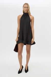 Front styled view CAMILLA AND MARC Elsen Halter Mini Dress in Black with open back, tie‑up neck and fluted crinoline hem.