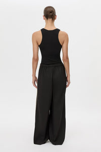 Back view CAMILLA AND MARC wide-leg Enna Pant in black with an elasticated high‑waistband.