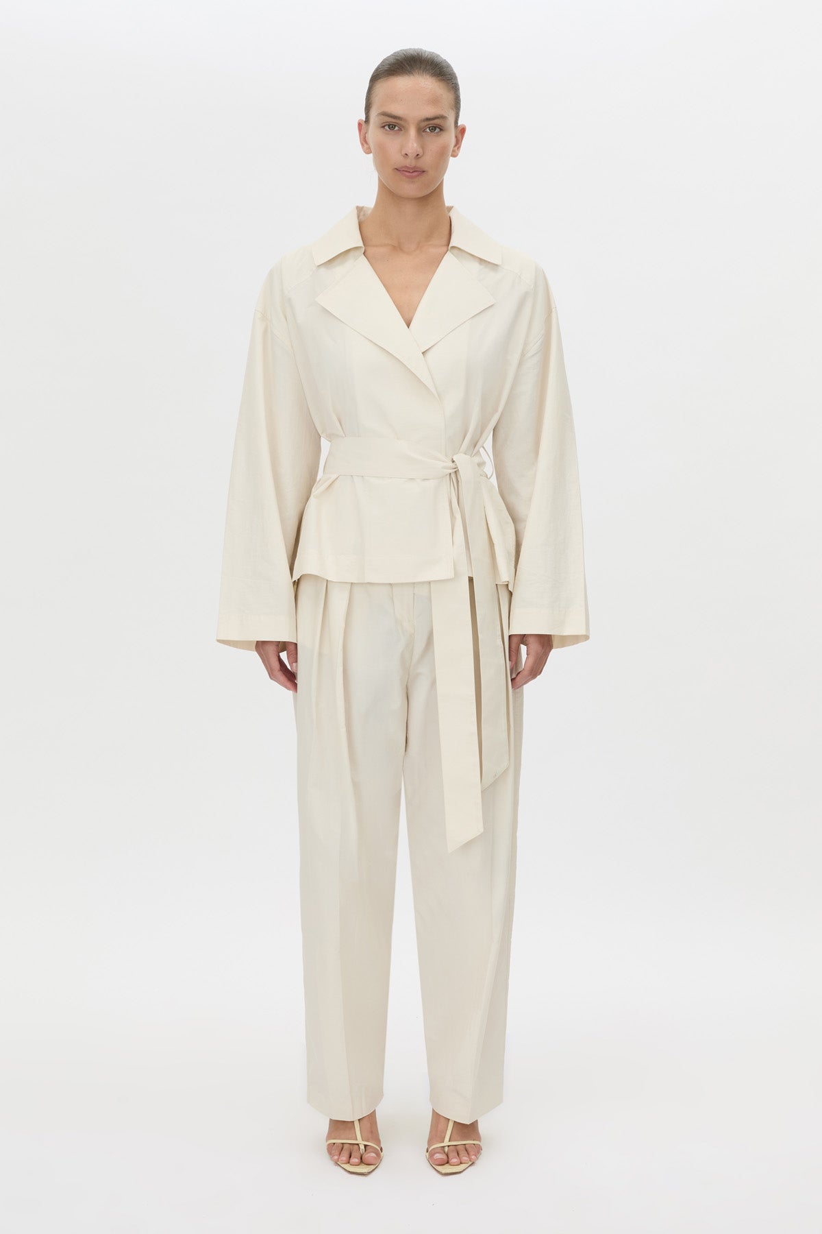 Front-styled view CAMILLA AND MARC Inca Belted Wrap Jacket in ivory.