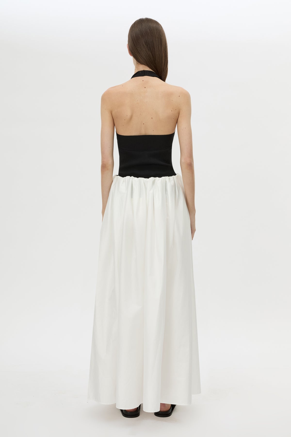 Back view CAMILLA AND MARC Juliet Knit Halter Top in Black with ribbed halter neckline.