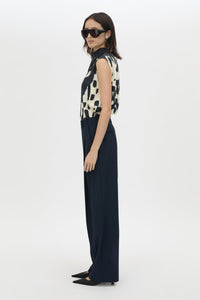 Side view CAMILLA AND MARC Lena Pant in Navy featuring a mid‑rise tailored cut with front tucks.