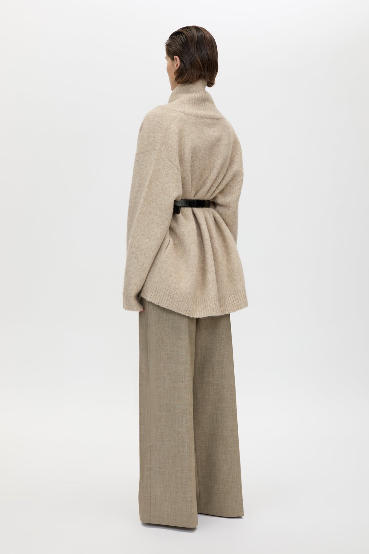 Back view CAMILLA AND MARC Leonie Knit Cardigan in Oatmeal Marle with wrap closure and waist tie.
