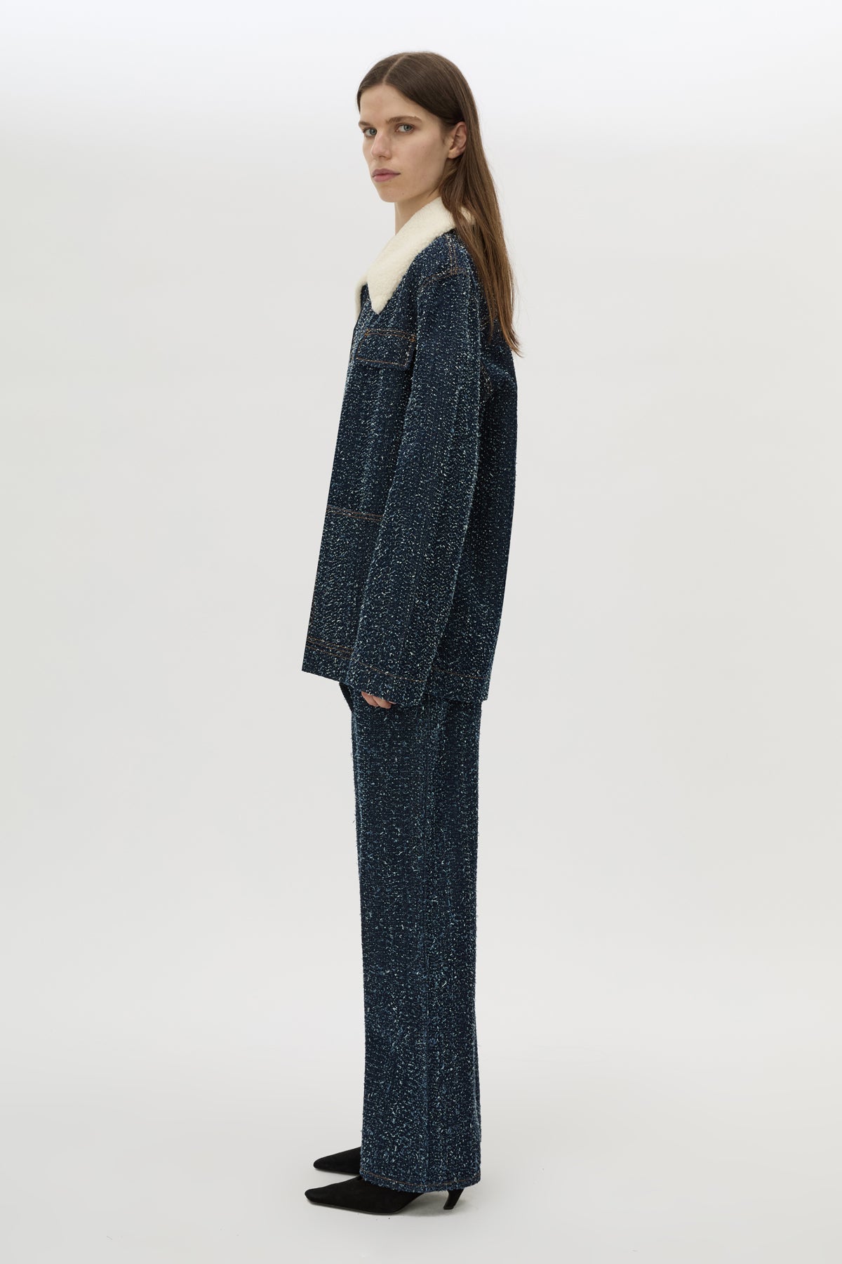 Side view CAMILLA AND MARC Luca Denim Utility Jacket in Indigo Neps with a detachable shearling collar.