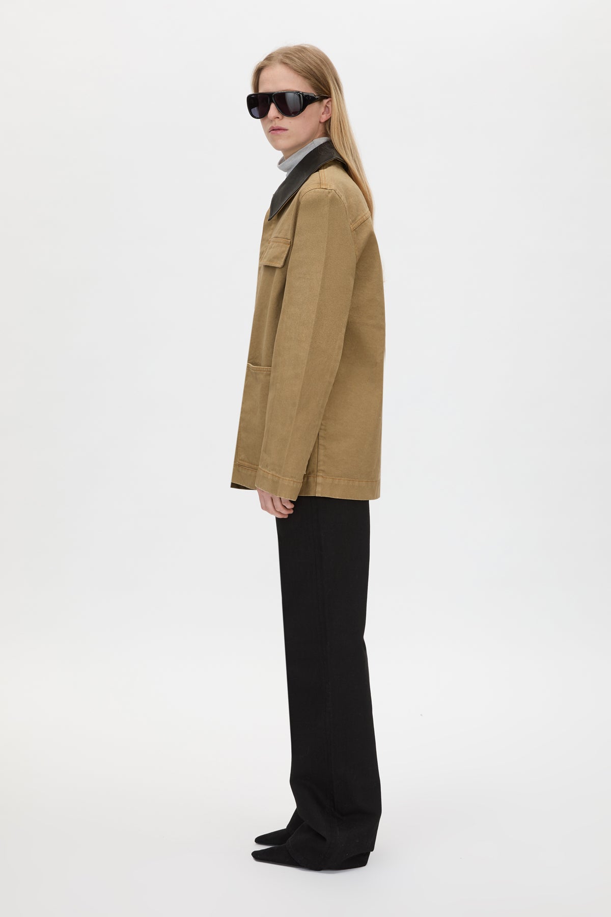 Side view CAMILLA AND MARC Luca Utility Jacket in Camel Brown with a contrast leather collar.