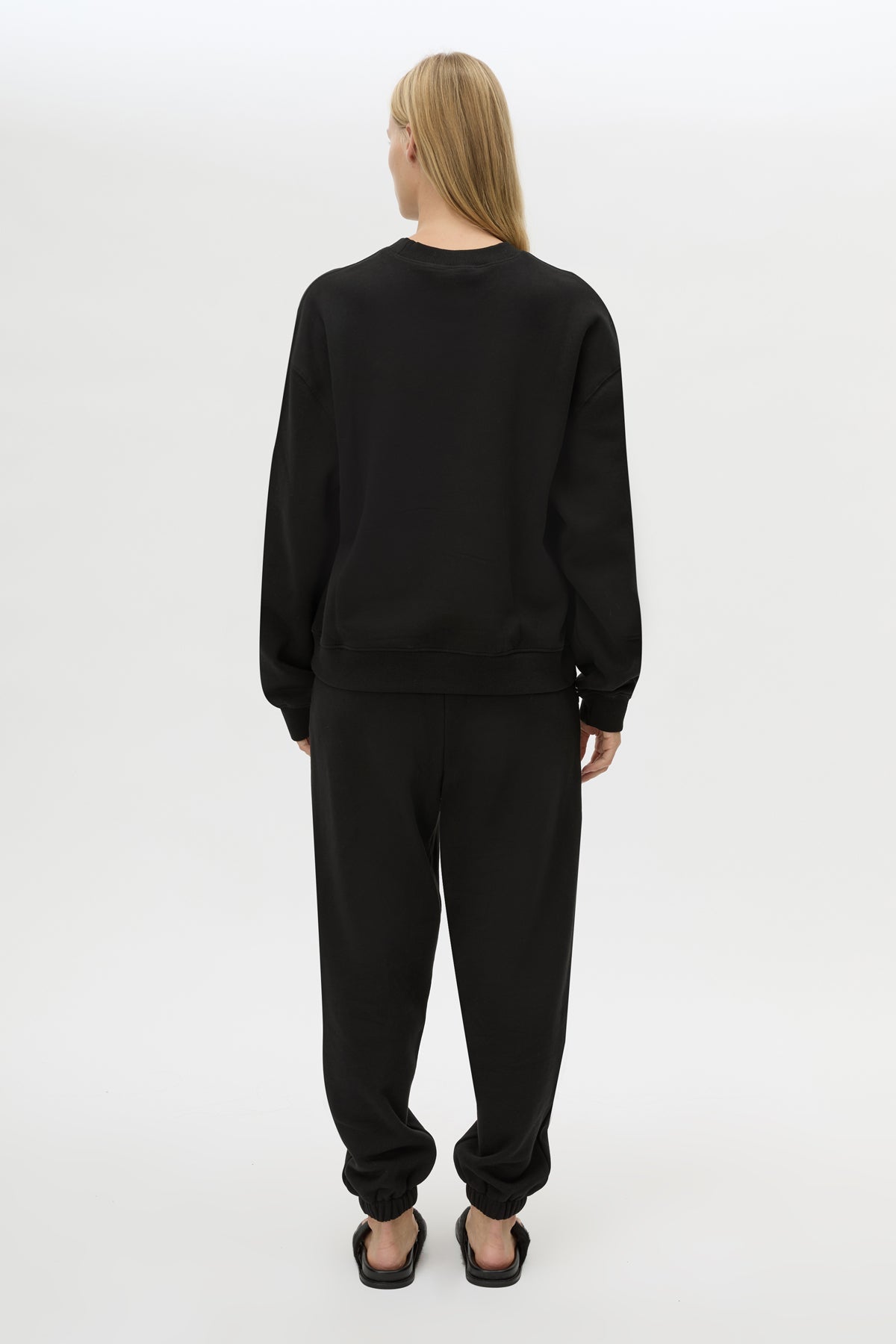 Back view CAMILLA AND MARC Lyra Embroidered Tracksuit Top in Black and White with relaxed fit.