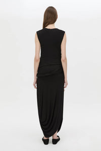 Back view CAMILLA AND MARC Myro Midi Dress in black with a fitted waistline and a twisted drape detail at the hip.