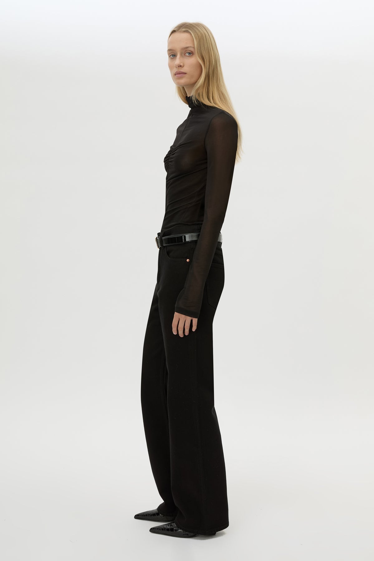 Side view CAMILLA AND MARC Novel Long Sleeve Stocking Top in Black with ruched bust detail.
