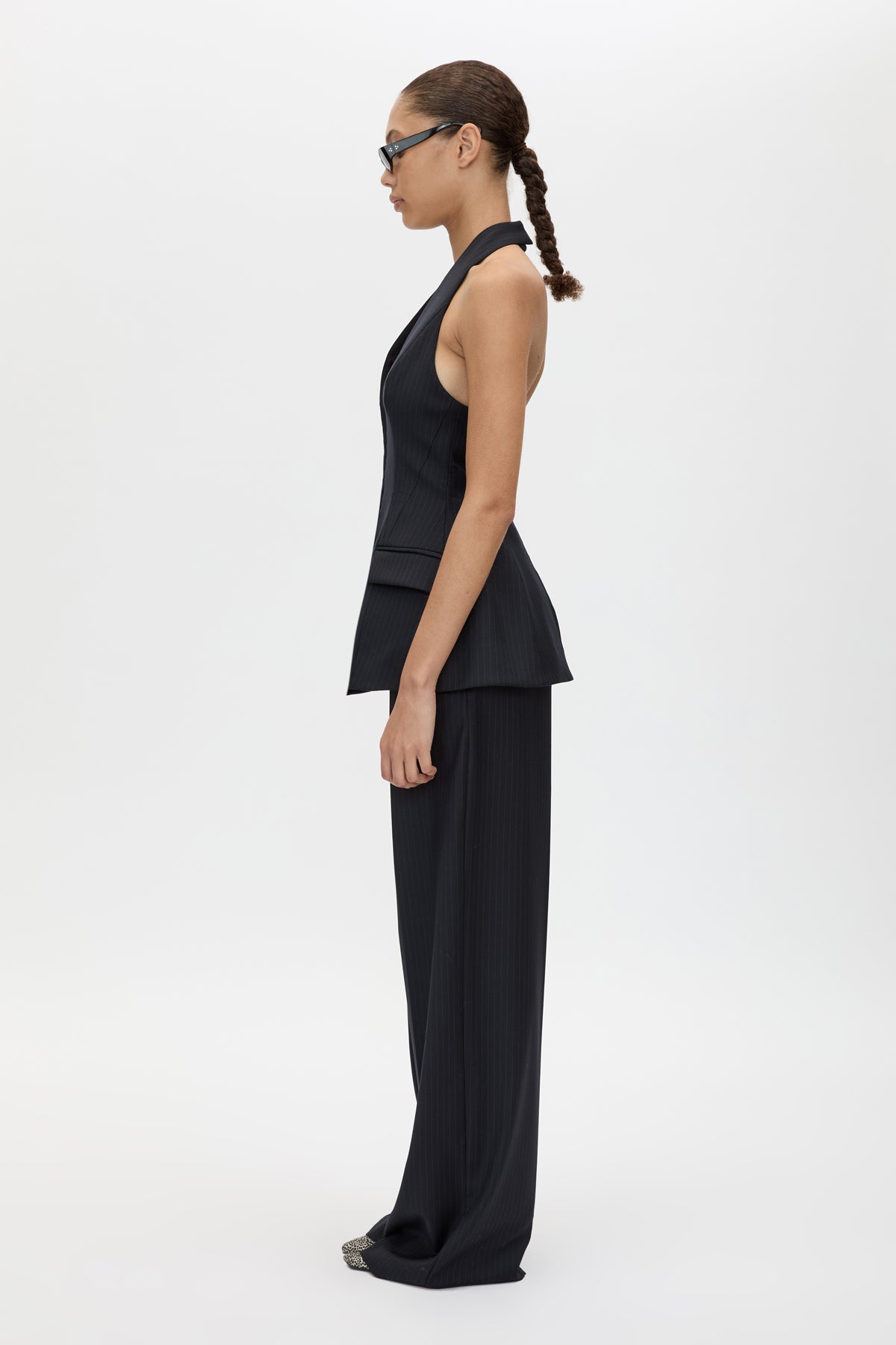 Side view CAMILLA AND MARC Orban Tailored Halter Top in Navy Pinstripe with deep V‑neck, fitted waist and open back.