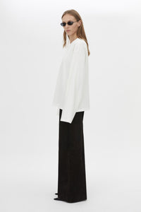 Side view CAMILLA AND MARC Peretti Long Sleeve Tee in White with wide shaped sleeves.  