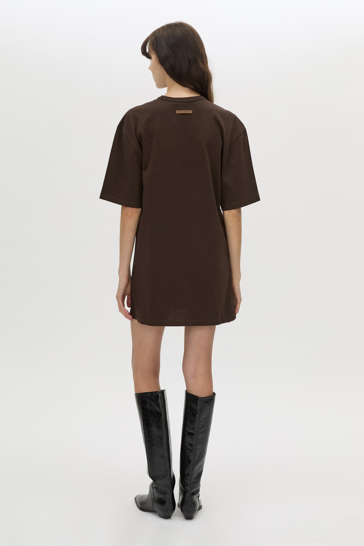 Back view CAMILLA AND MARC Peretti Mini Tee Dress in Espresso Brown with rolled short sleeves and mini tee silhouette.