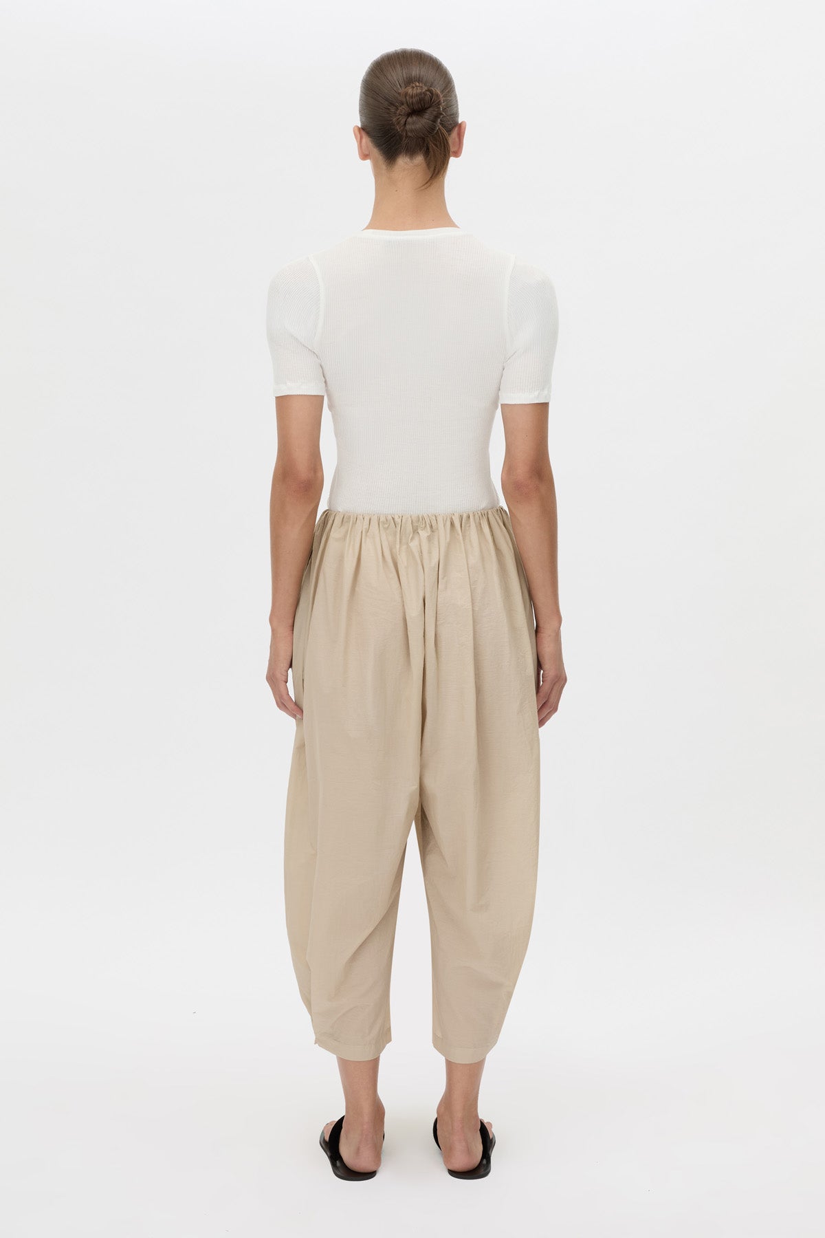 Back view CAMILLA AND MARC Pietro Gathered Wide Leg Pant in stone with a voluminous leg.