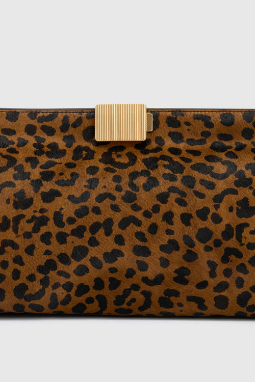 Cropped view CAMILLA AND MARC Poppy Leopard Clutch with pony‑finish fabrication.