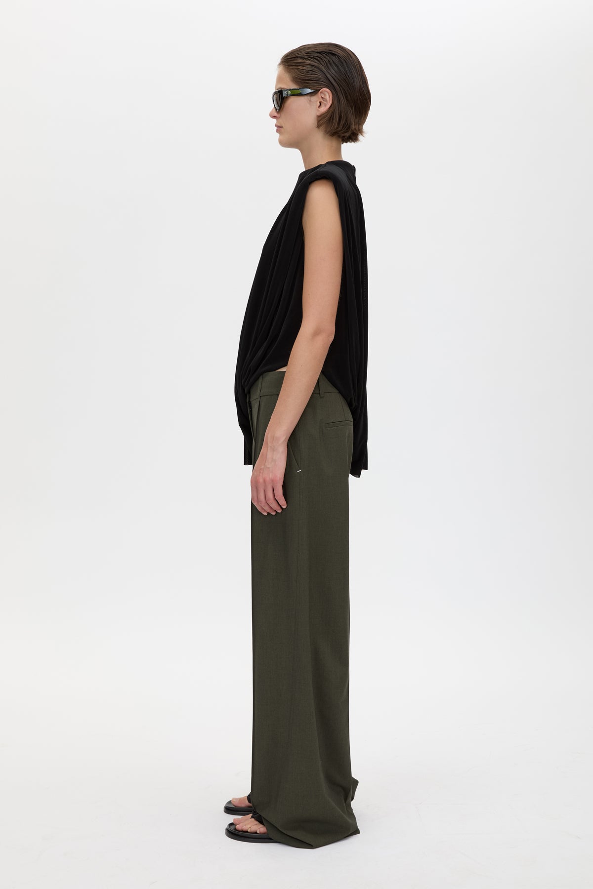Side view CAMILLA AND MARC Ravine Draped Top in Black with asymmetric silhouette.