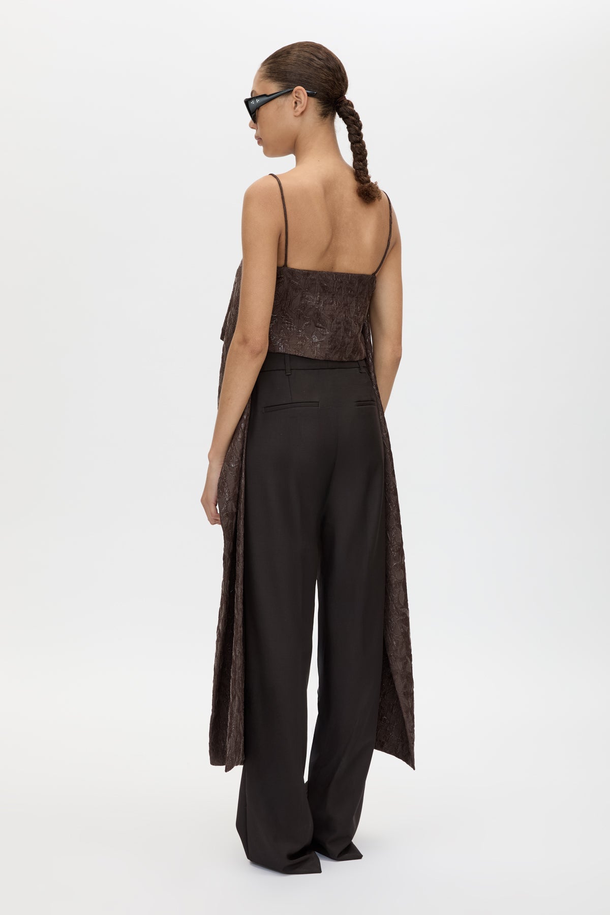 Back view CAMILLA AND MARC Rennick Cami Top in Chocolate with thin straps, cropped front hem and long draped back panels.