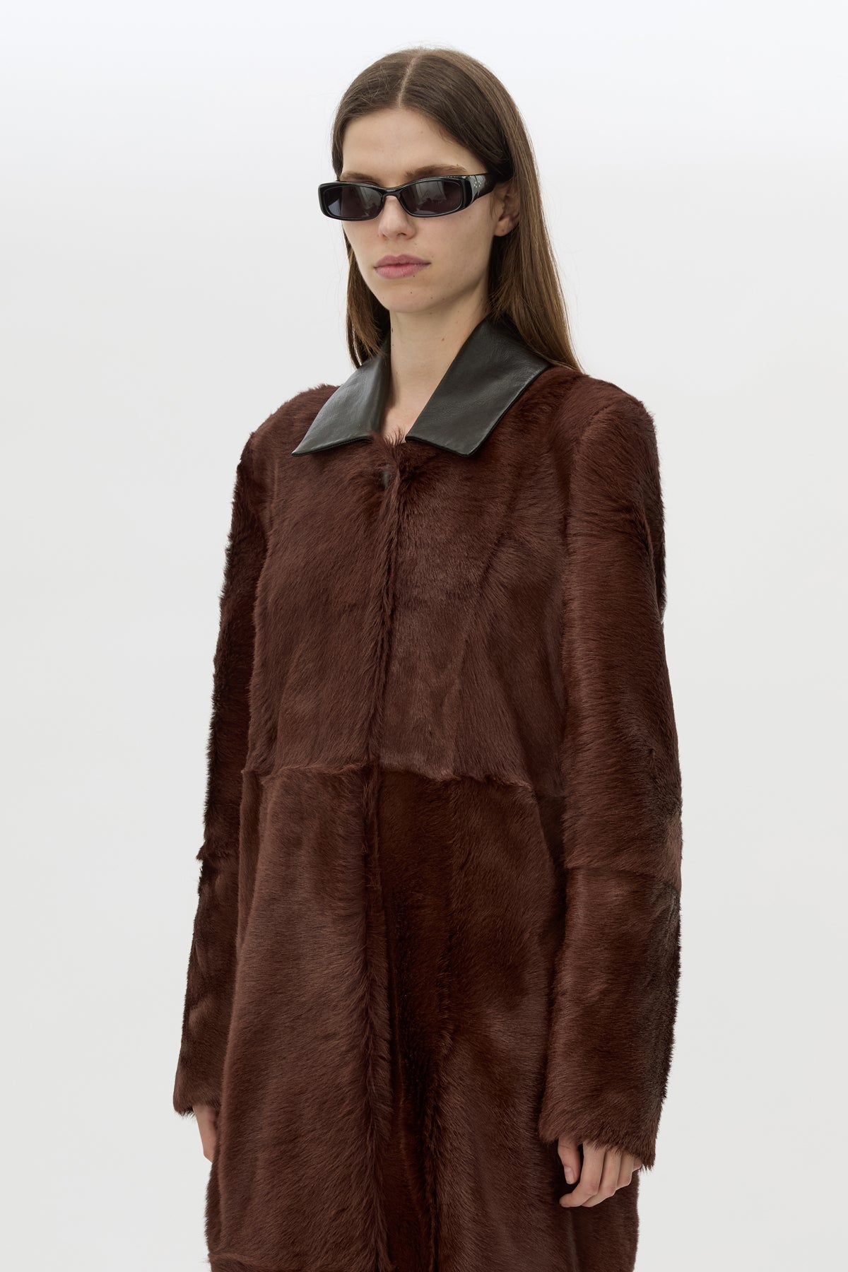Cropped view CAMILLA AND MARC Rina Coat in Chocolate Brown calf hair with contrast leather collar.