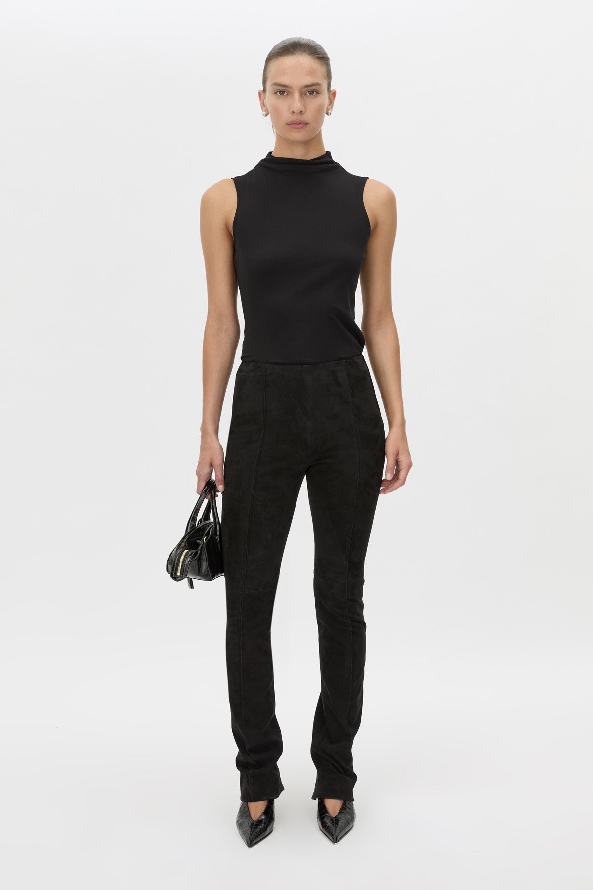 Front-styled view CAMILLA AND MARC high-waisted Romina Pant in black stretch suede fabrication.