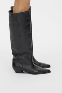 Side view CAMILLA AND MARC Rowan Knee Boot in Black tumbled‑look Italian cow leather.
