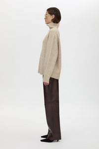 Side view CAMILLA AND MARC Selita Leather Pant in Burgundy with straight‑leg panelled leather construction.