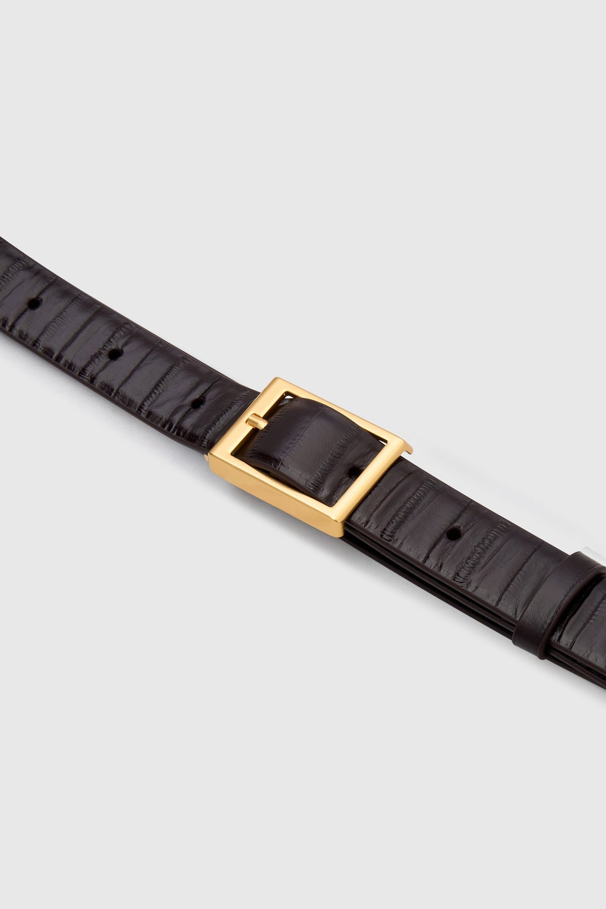 Cropped view CAMILLA AND MARC Sonny Eel Belt in Burgundy leather with textured eel embossing.