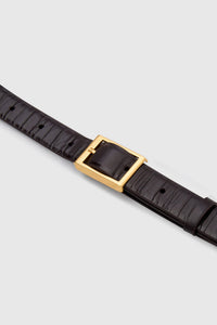 Cropped view CAMILLA AND MARC Sonny Eel Belt in Burgundy leather with textured eel embossing.