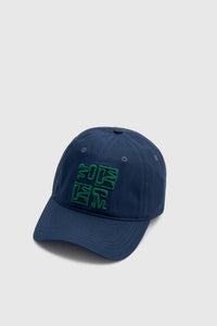 Ghost view CAMILLA AND MARC Sonora Embroidered Logo Cap in Deep Ink with embroidered artwork.