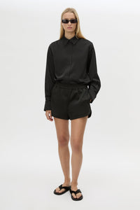 Front view CAMILLA AND MARC Tamar Mini Short in Black with relaxed fit and elasticated waistband.