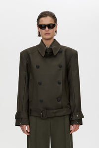 Cropped view CAMILLA AND MARC Tari Short Trench in Dark Khaki with contrast undercollar and shoulder pads.
