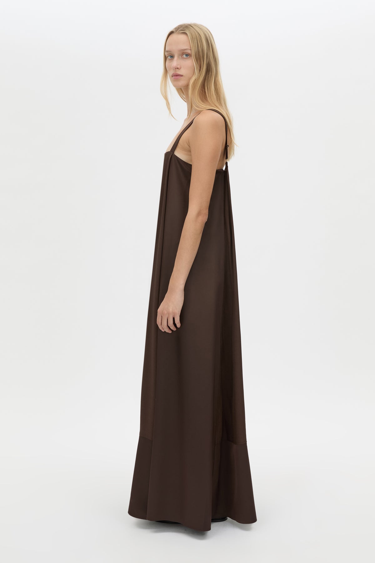 Side view CAMILLA AND MARC Tove Maxi Dress in Chocolate with a sleeveless silhouette and contrasting satin trim. 