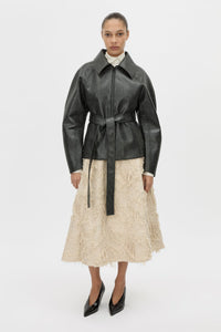 Front-styled view CAMILLA AND MARC tailored Tundra Skirt in stone with full circle silhouette skirt.