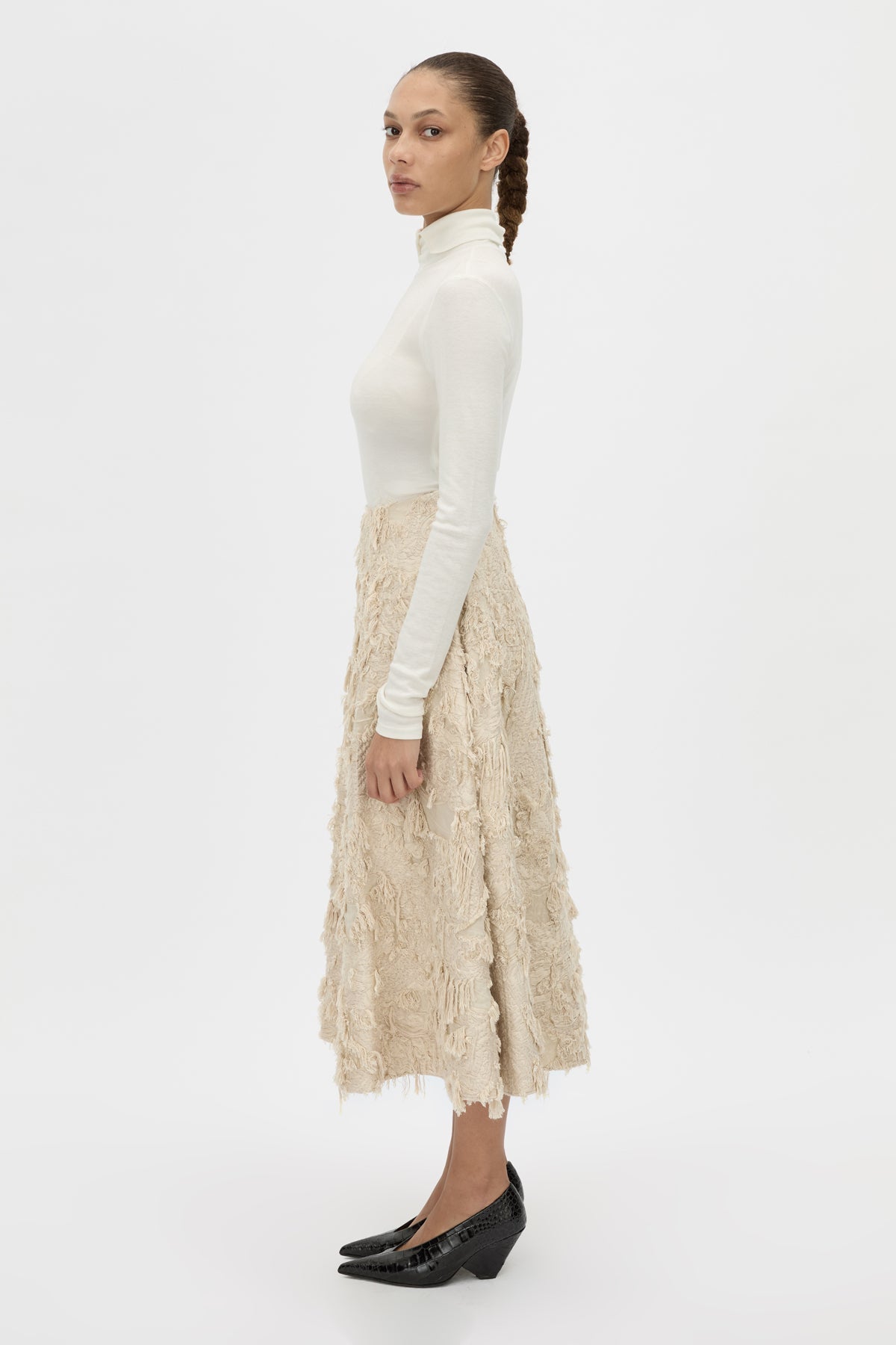 Side view CAMILLA AND MARC tailored Tundra Skirt in stone with full circle silhouette skirt.